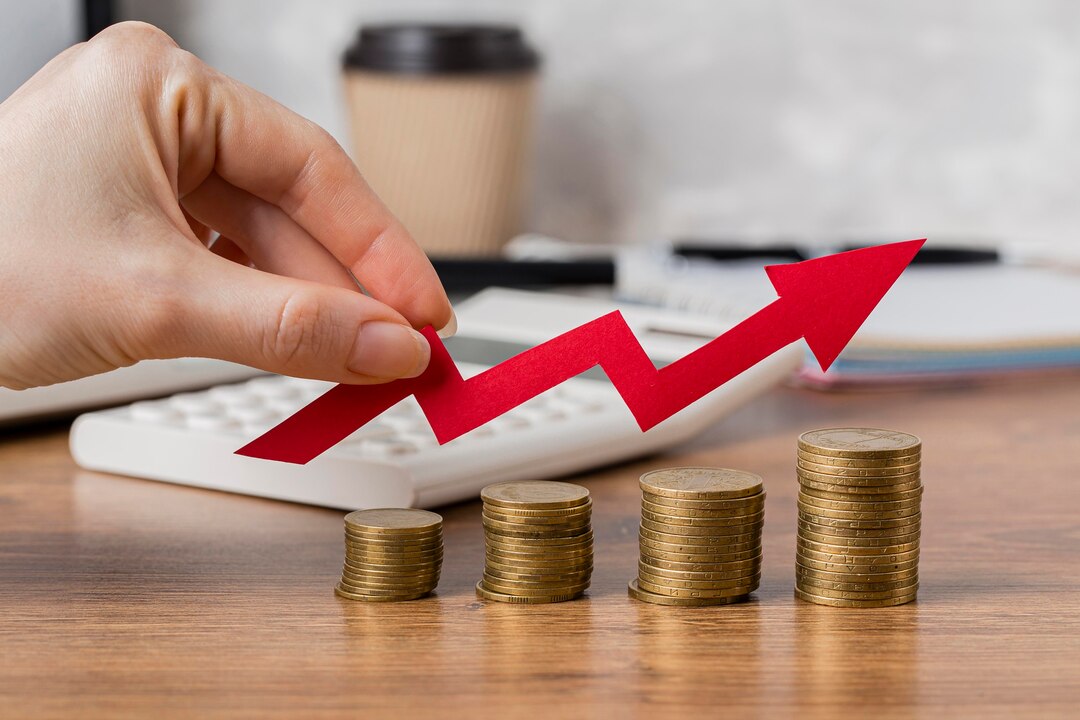 Brokerage investment growth concept with rising red arrow and stacked coins.