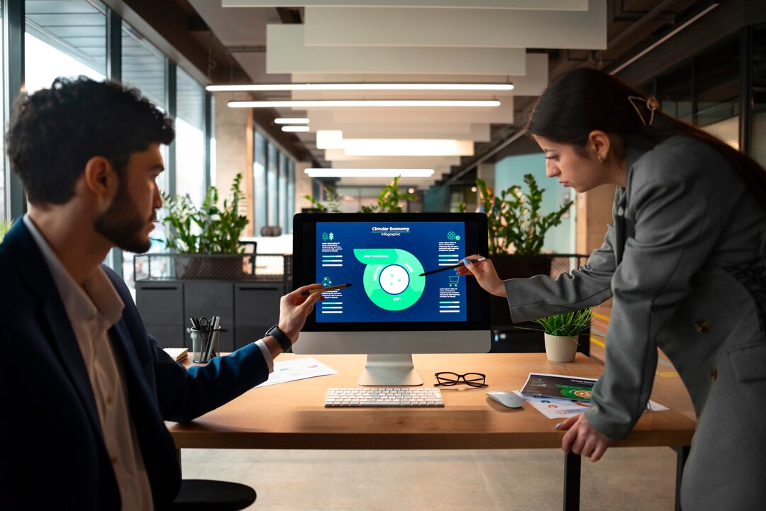 Brokerage professionals analyzing market trends and financial data on a computer screen.