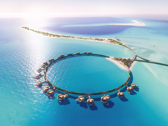 Aerial view of a circular luxury overwater resort, representing coastal Real Estate & Giga-Projects and sustainable tourism development.